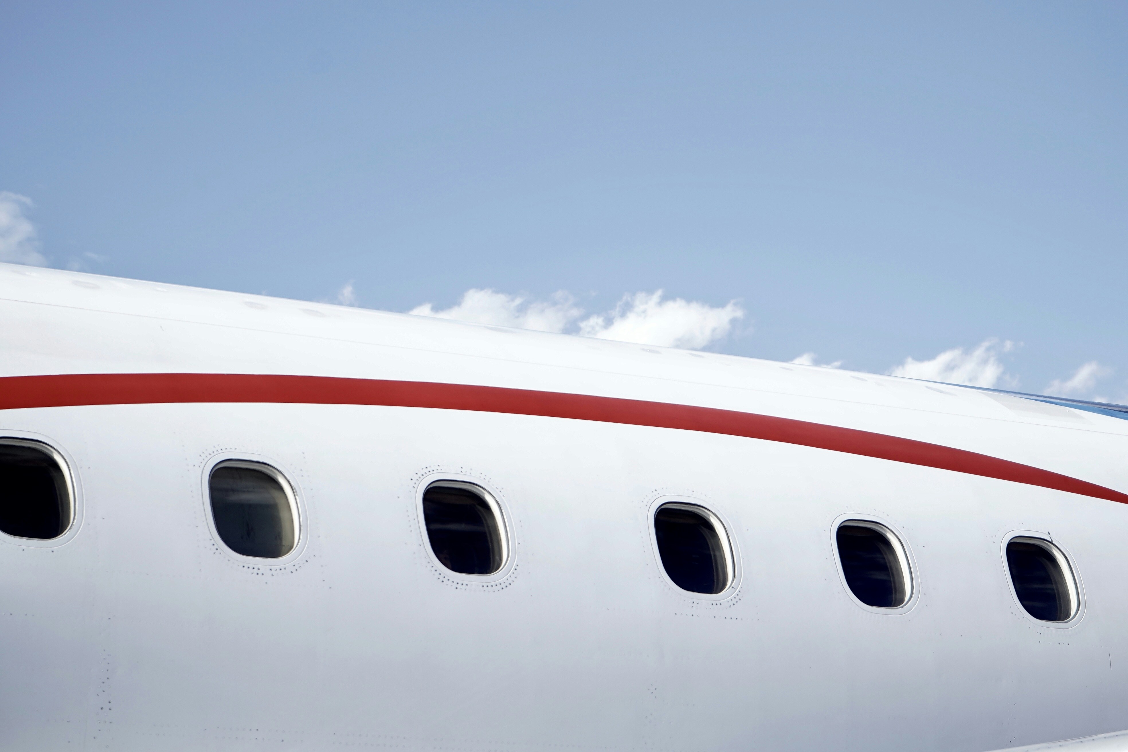 white and red airplane